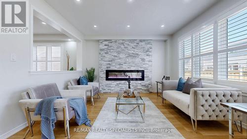 121 Longboat Run Road W, Brantford, ON - Indoor Photo Showing Living Room With Fireplace