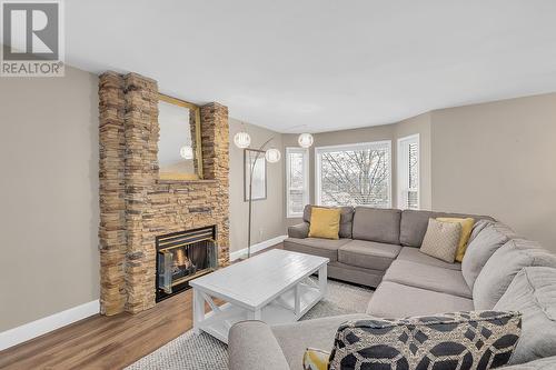 160 Portview Court, Kelowna, BC - Indoor Photo Showing Living Room With Fireplace