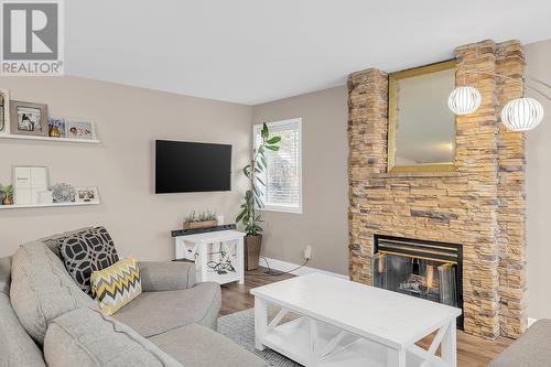 160 Portview Court, Kelowna, BC - Indoor Photo Showing Living Room With Fireplace