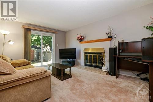 5989 Meadowglen Drive, Ottawa, ON - Indoor Photo Showing Living Room With Fireplace