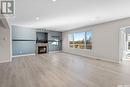 Brand Acreage, Corman Park Rm No. 344, SK  - Indoor Photo Showing Living Room With Fireplace 