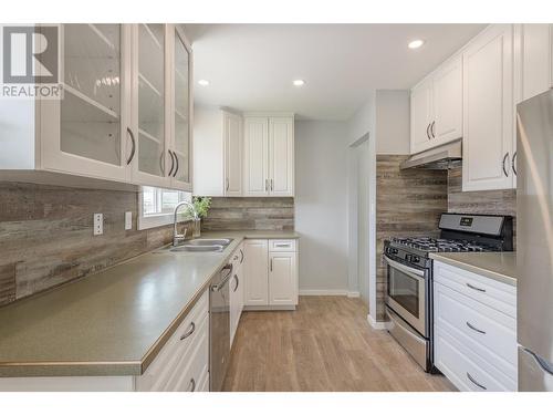 Large kitchen with loads of storage and ample counter space - 3600 13 Street, Vernon, BC 