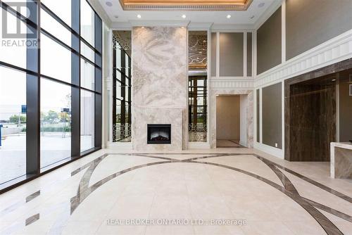 1110 - 9075 Jane Street, Vaughan, ON - Indoor Photo Showing Other Room With Fireplace