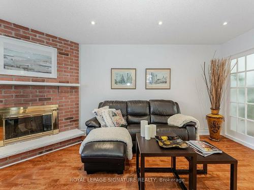 36 Smye Crt, Brampton, ON - Indoor Photo Showing Living Room With Fireplace