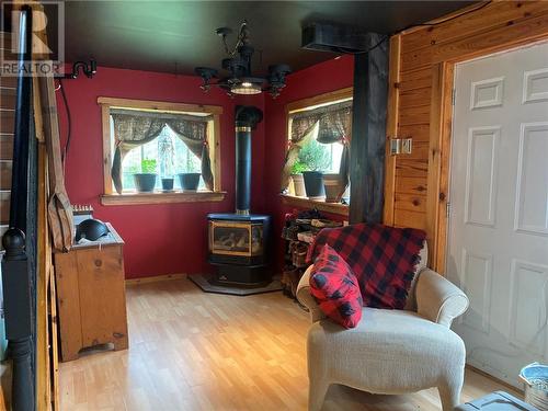 110 Champlain Trail, Westree, ON - Indoor With Fireplace