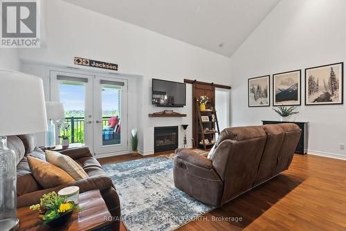 302 - 10 Brandy Lane Drive, Collingwood, ON - Indoor Photo Showing Living Room With Fireplace