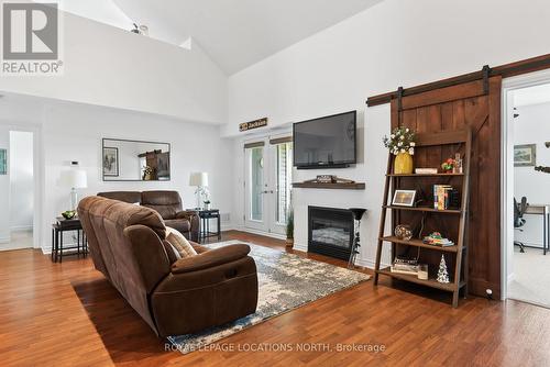 302 - 10 Brandy Lane Drive, Collingwood, ON - Indoor Photo Showing Living Room With Fireplace