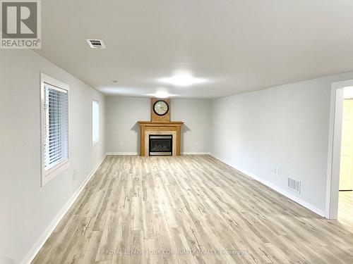 24 Sun King Crescent, Barrie, ON - Indoor Photo Showing Living Room With Fireplace