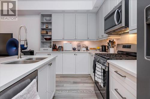 74 Discovery Trail, Midland, ON - Indoor Photo Showing Kitchen With Double Sink