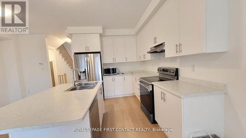 109 Sagewood Avenue N, Barrie, ON - Indoor Photo Showing Kitchen With Double Sink