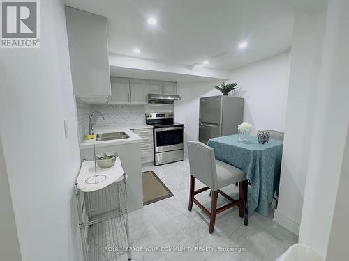 Bsmt - 24 Nasmith Street, Brampton, ON - Indoor Photo Showing Kitchen With Double Sink