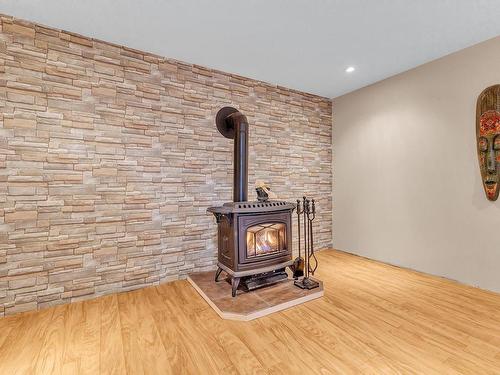 Family room - 10 Rue Fanny, Val-Des-Monts, QC - Indoor Photo Showing Other Room With Fireplace