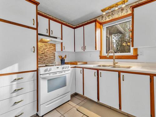 Kitchen - 10 Rue Fanny, Val-Des-Monts, QC - Indoor Photo Showing Kitchen With Double Sink