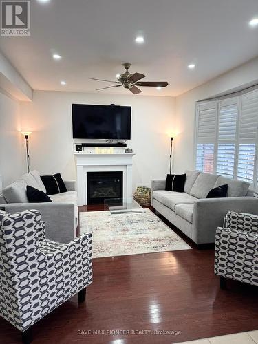 16 Mcechearn Crescent E, Caledon, ON - Indoor Photo Showing Living Room With Fireplace