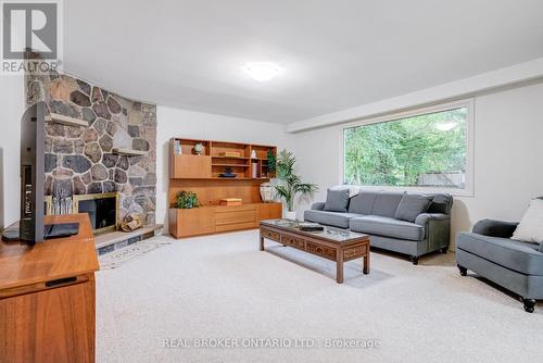 18 Burnt Log Crescent, Toronto, ON - Indoor Photo Showing Living Room With Fireplace