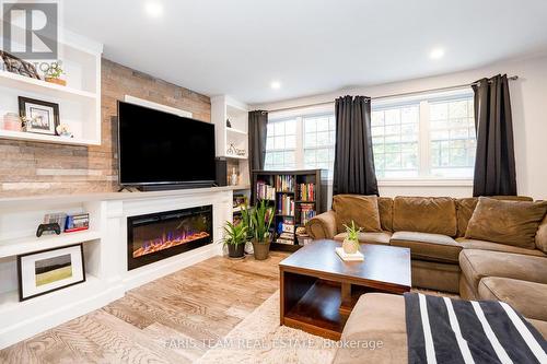 33 Frank Street, Wasaga Beach, ON - Indoor Photo Showing Living Room With Fireplace