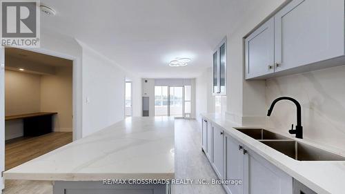 705 - 7373 Kennedy Road, Markham, ON - Indoor Photo Showing Kitchen With Double Sink