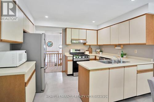 12 Archer Court, Brampton, ON - Indoor Photo Showing Kitchen With Double Sink