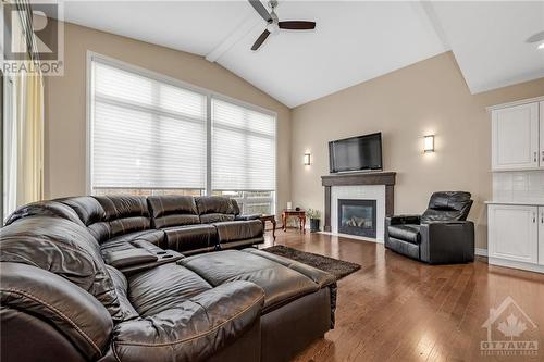 243 Balikun Heights, Ottawa, ON - Indoor Photo Showing Living Room With Fireplace