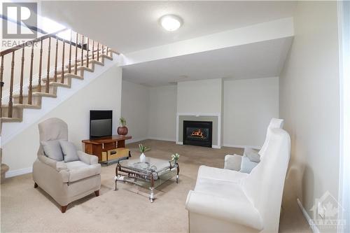 105 Rustwood Private, Ottawa, ON - Indoor With Fireplace