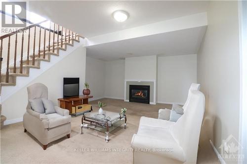 105 Rustwood, Ottawa, ON - Indoor Photo Showing Other Room With Fireplace