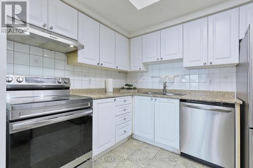 1013 - 135 Hillcrest Avenue, Mississauga, ON - Indoor Photo Showing Kitchen With Double Sink