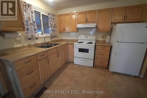 11 Nightingale Lane, Belleville, ON - Indoor Photo Showing Kitchen With Double Sink