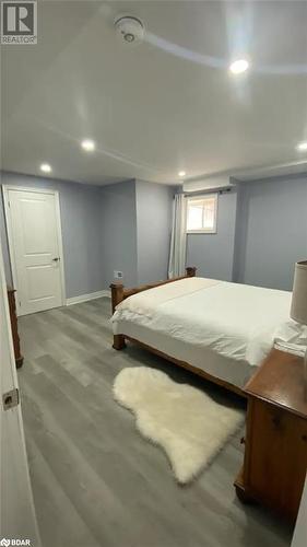 Bedroom with light hardwood / wood-style flooring - 896 John Street Street Unit# B2, Innisfil, ON - Indoor