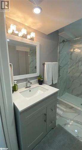 Bathroom with a tile shower and vanity - 896 John Street Street Unit# B2, Innisfil, ON - Indoor Photo Showing Bathroom