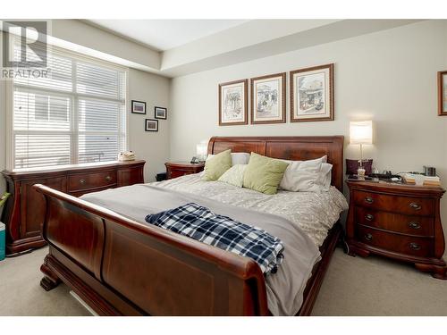 Primary Bedroom - 1331 Ellis Street Unit# 209, Kelowna, BC - Indoor Photo Showing Bedroom