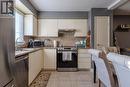 84 - 8141 Coventry Road, Niagara Falls (218 - West Wood), ON  - Indoor Photo Showing Kitchen With Double Sink 