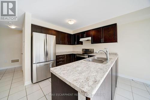 44 Carew Boulevard, Kawartha Lakes, ON - Indoor Photo Showing Kitchen With Double Sink