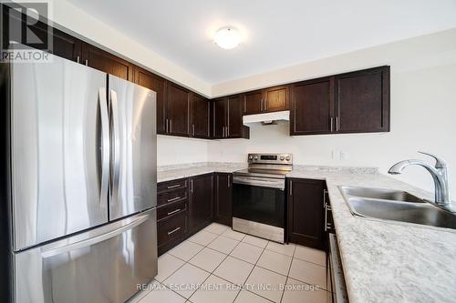 44 Carew Boulevard, Kawartha Lakes, ON - Indoor Photo Showing Kitchen With Double Sink