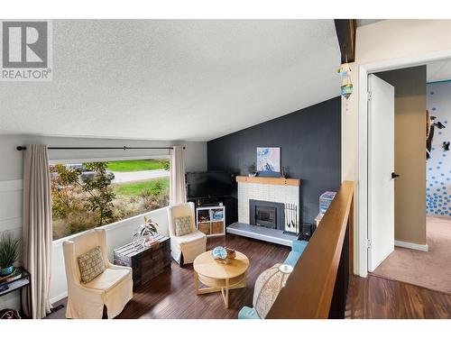 67 Burke Drive, Revelstoke, BC - Indoor Photo Showing Living Room With Fireplace