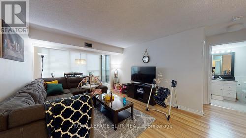 202 - 700 Constellation Drive, Mississauga, ON - Indoor Photo Showing Living Room