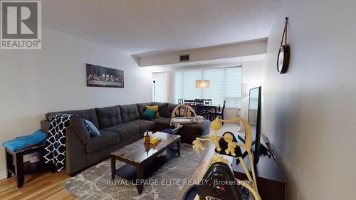 202 - 700 Constellation Drive, Mississauga, ON - Indoor Photo Showing Living Room