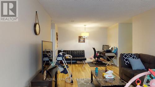 202 - 700 Constellation Drive, Mississauga, ON - Indoor Photo Showing Living Room