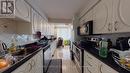 202 - 700 Constellation Drive, Mississauga, ON  - Indoor Photo Showing Kitchen With Double Sink 