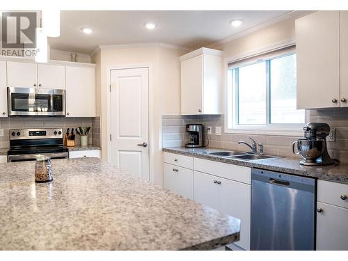 64 Johnson Way, Revelstoke, BC - Indoor Photo Showing Kitchen With Double Sink