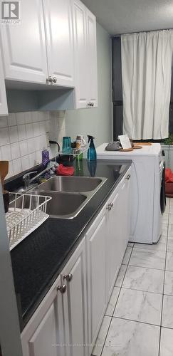 403 - 4 Kings Cross Road, Brampton, ON - Indoor Photo Showing Kitchen With Double Sink