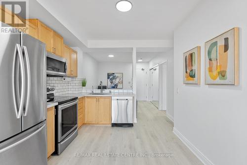 502 - 200 Burnhamthorpe Road E, Mississauga, ON - Indoor Photo Showing Kitchen With Double Sink