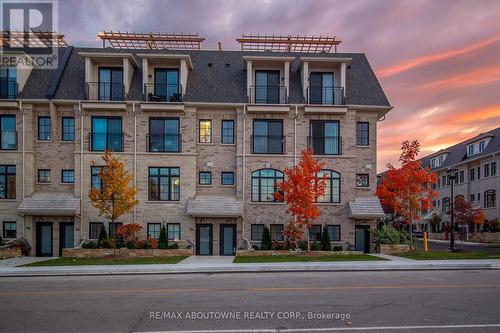 105 - 130 Joymar Drive, Mississauga, ON - Outdoor With Balcony With Facade