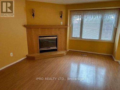 74 - 2275 Credit Valley Road, Mississauga, ON - Indoor Photo Showing Living Room With Fireplace