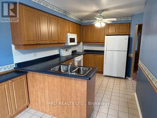 74 - 2275 Credit Valley Road, Mississauga, ON - Indoor Photo Showing Kitchen With Double Sink