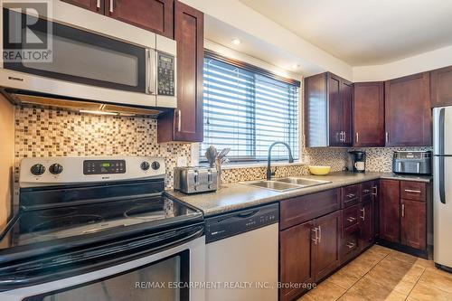 702 Seventh Avenue, Hamilton, ON - Indoor Photo Showing Kitchen With Double Sink