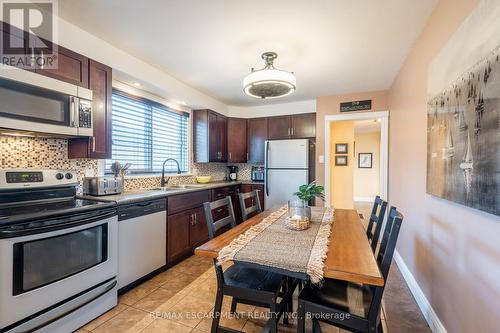 702 Seventh Avenue, Hamilton, ON - Indoor Photo Showing Kitchen With Double Sink