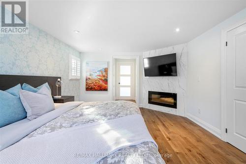 26 Cherrydale Court, Toronto, ON - Indoor Photo Showing Bedroom With Fireplace