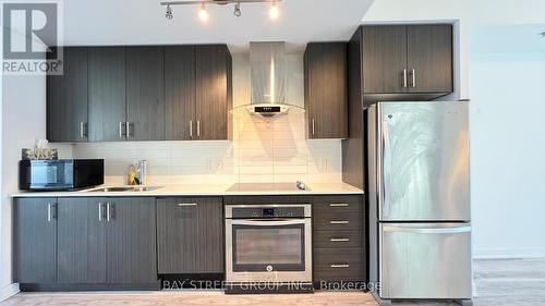 Th1 - 205 Bonis Avenue, Toronto, ON - Indoor Photo Showing Kitchen With Double Sink