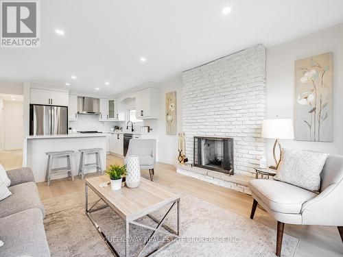 2223 Urwin Crescent, Oakville, ON - Indoor Photo Showing Living Room With Fireplace