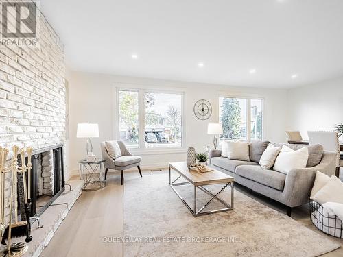 2223 Urwin Crescent, Oakville, ON - Indoor Photo Showing Living Room With Fireplace